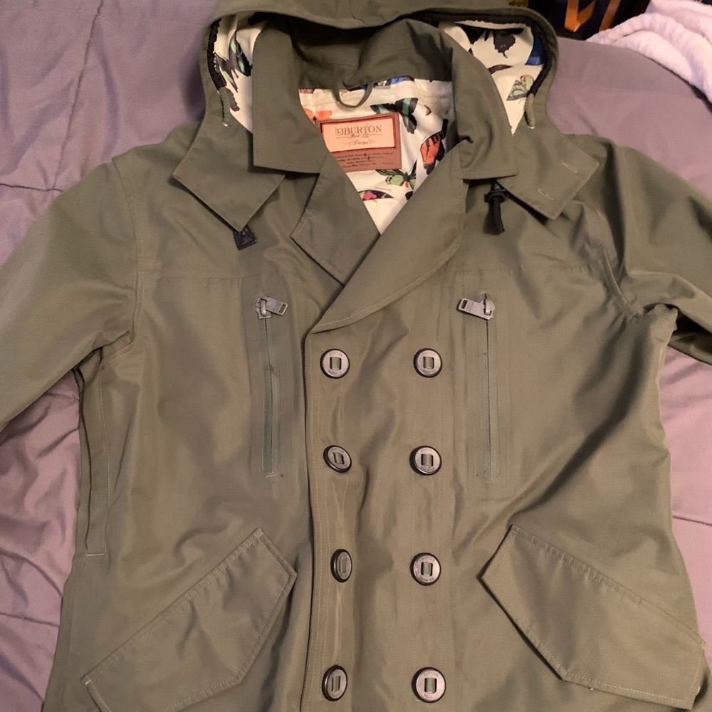 Green raincoat with a hood